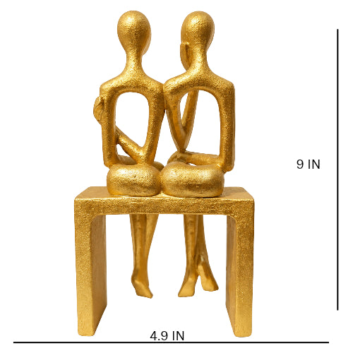 Golden abstract couple sitting on bench showpiece -luxury artistic home decor showpiece for living room, office, study and tabletop decoration
