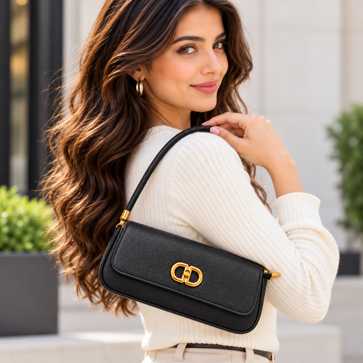 Black baguette party sling handbag with gold clasp